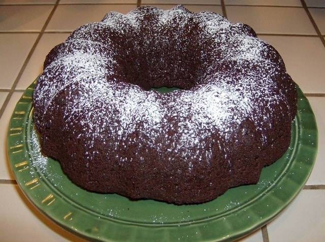 Need an easy dessert? Make this simple, yet elegant Triple Chocolate Bundt Cake recipe using a box of cake mix, pudding, and chocolate chips.
