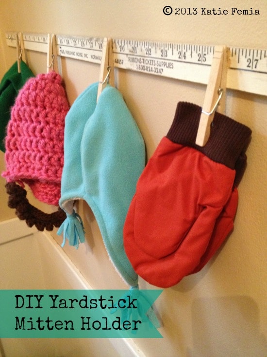 Easy Upcycled Yardstick Mitten Holder: Stay organized this winter and make this DIY mitten holder for 2 dollars using a yard stick and clothes pins.