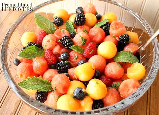 Mojito Fruit Salad: Watermelon & Berry Salad with Mint-Lime Dressing - A ruit salad made of watermelon, cantaloupe, and berries flavored with mint and lime.