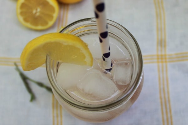 Homemade lavender lemonade recipe with lemon and lavender garnish