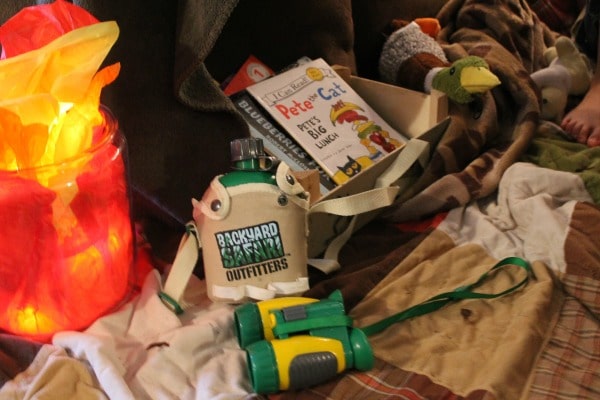 Use toys and stuffed animals to create an outdoor feel for your kids indoor camp out