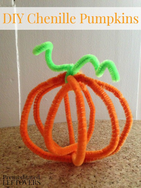 DIY Chenille Pumpkins - A fun fall craft for kids. You can make these Chenille Pumpkins for one dollar. All you need is orange and green pipe cleaners.