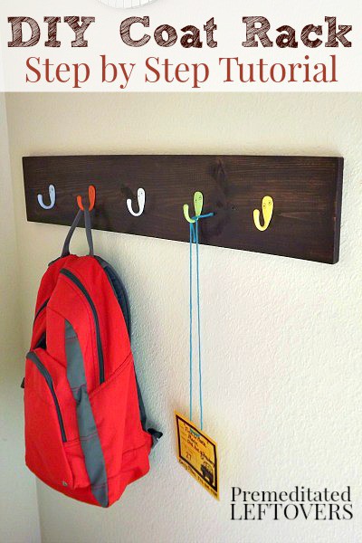 A frugal DIY Coat Rack with Hooks. Use this DIY Coat Rack Tutorial to create a coat rack for the wall of your entry way keeping the area organized and clean.