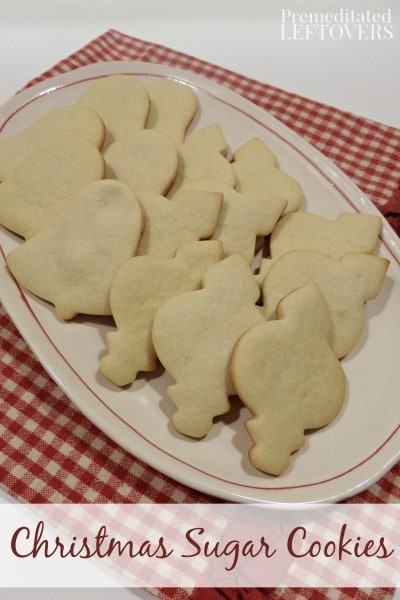 This Christmas Sugar Cookie Recipe produce crisp sugar cookies with a delicious flavor! The dough is easy to roll out and it holds the shapes well for cut outs. 