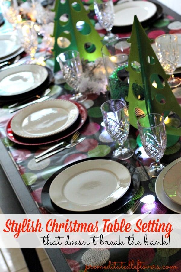 Setting your table for Christmas doesn't have to break the bank. Read my tips on how to pull of a Stylish Green, Red and White Christmas Table Setting. Pin it for later!