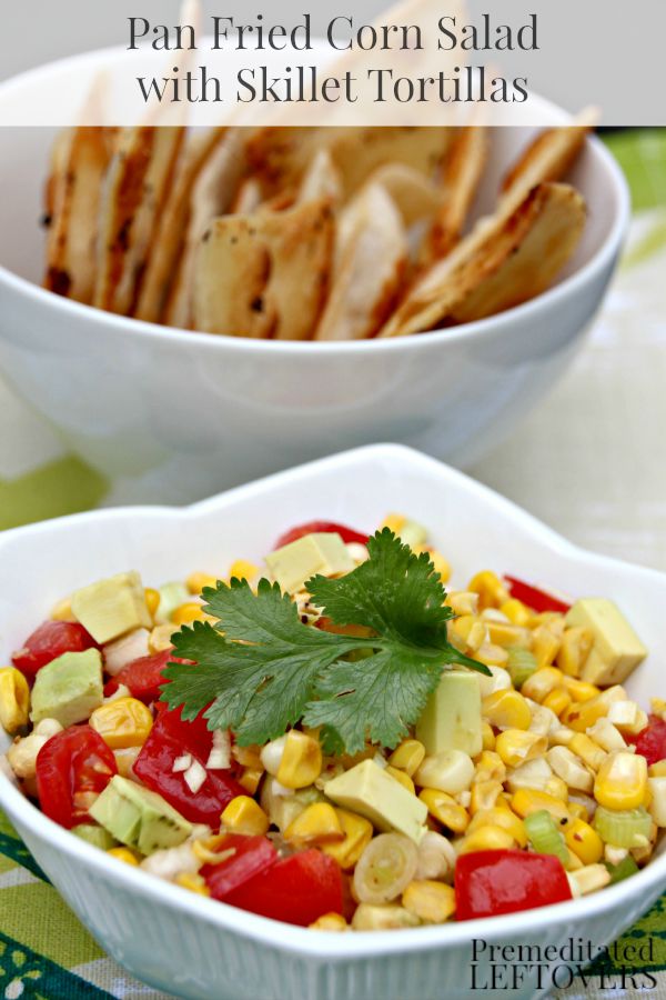 Pan Fried Corn Salad with Skillet Tortilla Chips- Looking for a great Tex Mex side dish? Try this colorful corn salad recipe with homemade tortilla chips. 