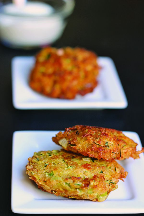 Zucchini Fritters Recipe- These zucchini cakes, dipped in homemade ranch dressing, make a delicious side dish for suppers or a great snack on their own.