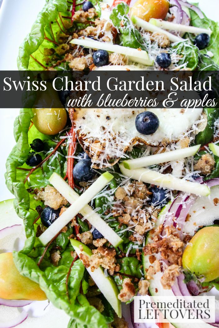 Swiss Chard Garden Salad- This garden salad is bursting with flavorful ingredients over a bed of swiss chard. It is a nutritious and simple salad to make. 
