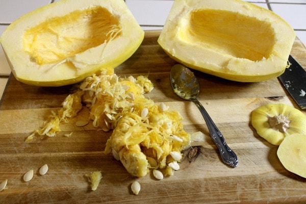 Cut spaghetti squash and remove the seeds before roasting