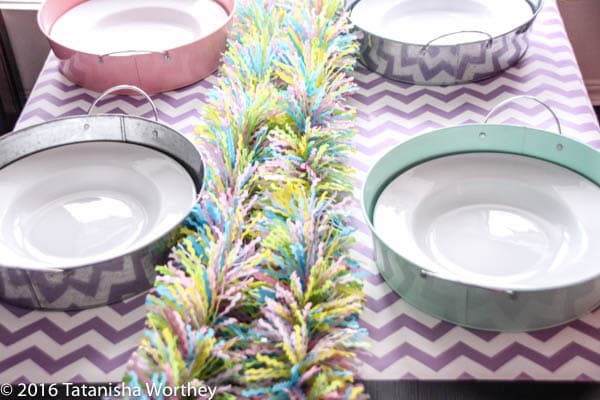 Pastel Easter Tablescape tin plates and garland