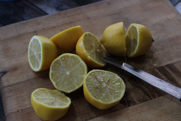 Homemade Mint Lemonade cutting lemons