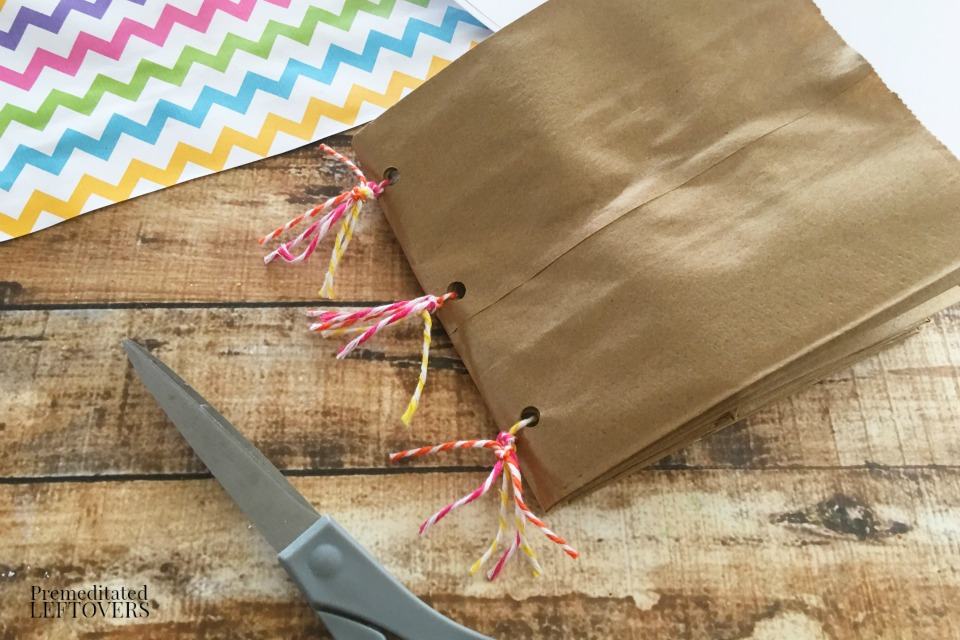 How to Make a Paper Bag Book for Kids - cutting twine