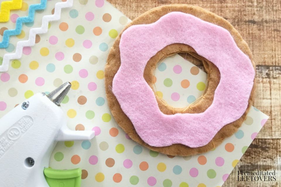 How to Make a Felt Donut Toy Food for Kids- hot glue frosting to felt donut