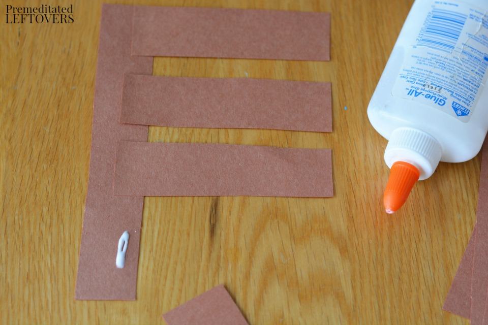 Apple Stamping Craft- glue short strips to long strip
