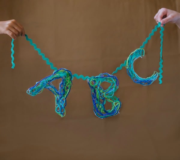 How to Make String Letters with Yarn and Glue - This is a fun and easy Alphabet Craft for kids. It includes alphabet Game Ideas for Kids using the string letters.