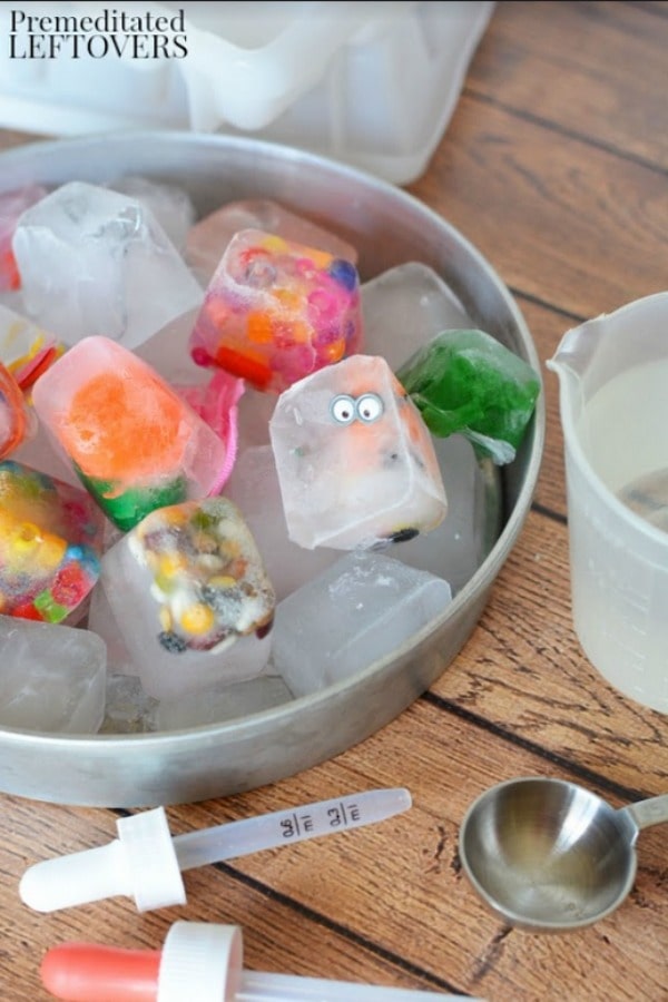 Ice Cube Discovery Activity for Kids- empty cubes into bowl