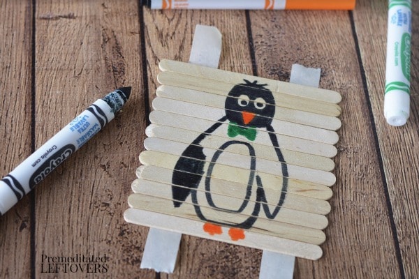Popsicle Stick Penguin Puzzle Craft- draw penguin with markers