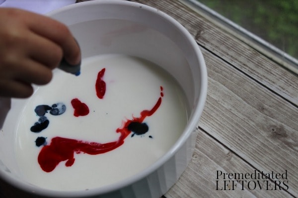 Exploding Colors Science Experiment- drop food coloring in milk