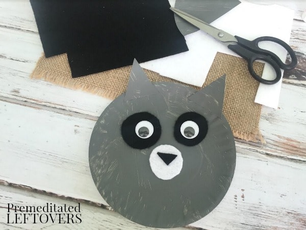 Raccoon Paper Plate Craft- cut eyes and ears