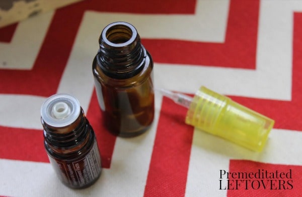 10 Recipes for Upcycling Your Essential Oil Bottles- essential oil bottles and spray top