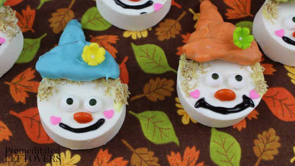 Enjoy Scarecrow Cookies Chocolate Covered Oreos that are fun and whimsical treats for the fall season!
