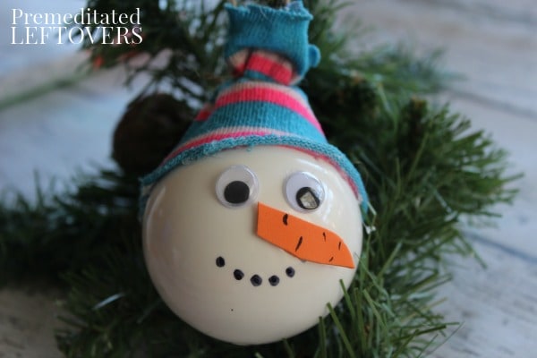 This Snowman Christmas Ornament craft is a fun and simple way for kids to decorate the tree. It is also a sweet, homemade gift for friends and relatives.