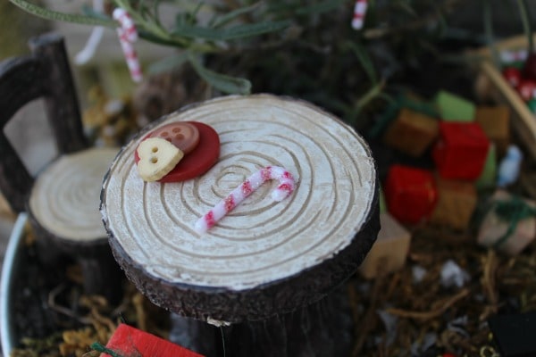 christmas fairy garden-table with buttons and candy cane