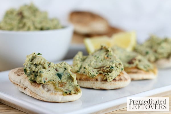 This Chicken, Kale, and Raisin Salad Spread is a delicious snack with mini pitas. It's also a great recipe for using leftover chicken you may have on hand.