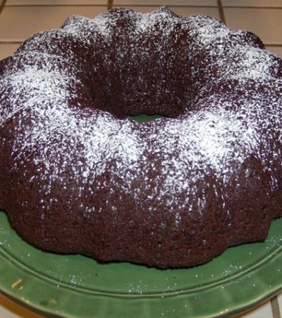 Easy Triple Chocolate Bundt Cake Recipe using a boxed cake mix, pudding, and chocolate chips.