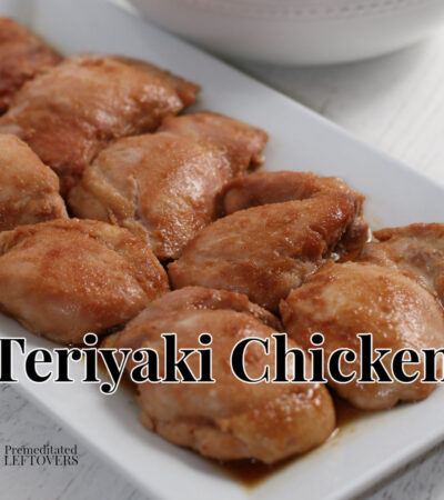 Teriyaki chicken on a white platter.