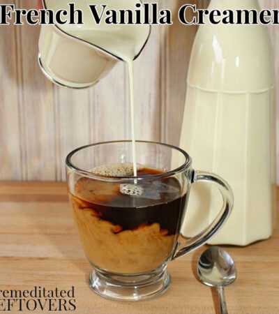 pour homemade french vanilla coffee creamer recipe into a cup of coffee.jpg