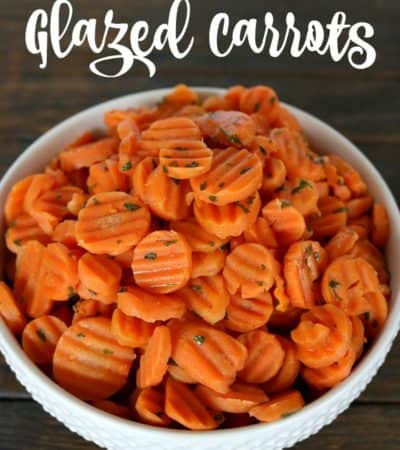Quick and easy glazed carrots recipe with parsley in white serving bowl.