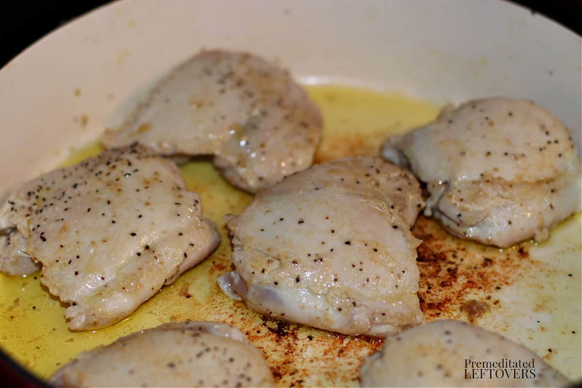 browning chicken thighs in a braiser