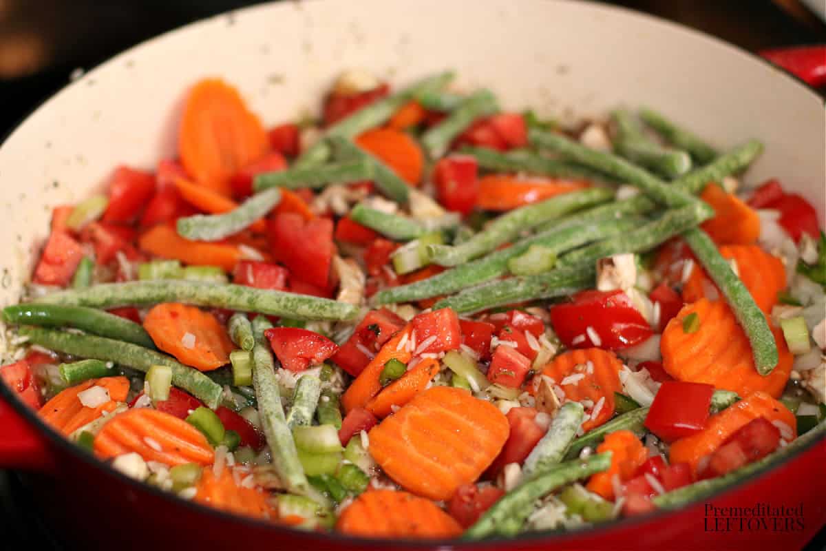 rice and vegetables in oven-safe skillet pan