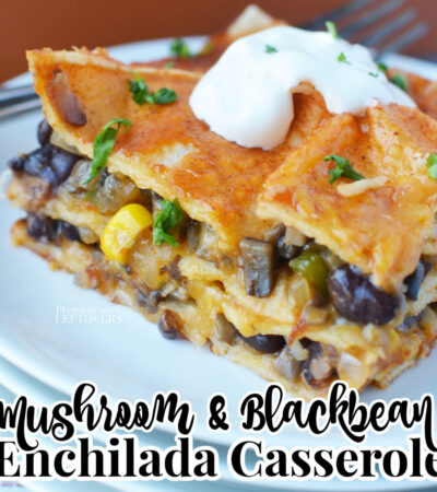 a slice of mushroom and black bean enchilada casserole on a white plate