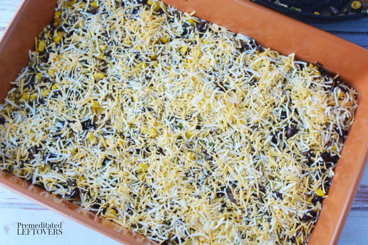 sprinkle cheese over the mushroom and black bean mixture