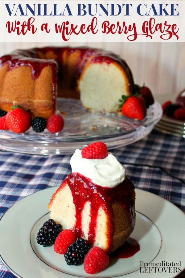 Vanilla Bundt Cake with Berry Glaze on a cake platter with a slice of cake on a plate topped with mixed berry glaze, berries, and homemade whipped cream.