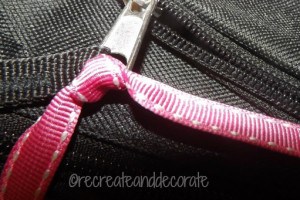 how to make a custom decorated backpack - use a small ribbon in the zipper pull