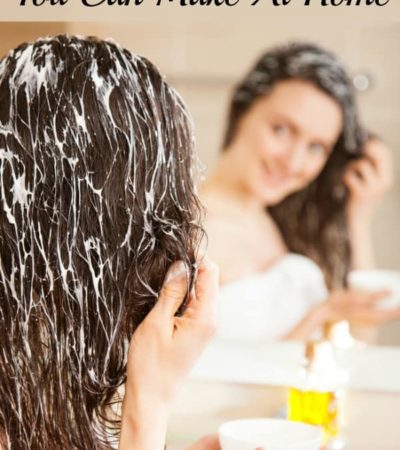 Woman applying natural hair treatment