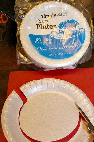 cut out the bottom of a plate to create a template 