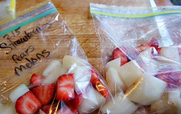 Make freezer packs with extra produce to avoid waste - fruit freezer packs are perfect for smoothies