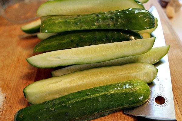how to make refrigerator pickles - quarter the cucumbers