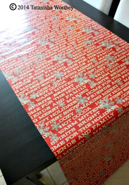 Christmas wrapping table decor idea using wrapping paper