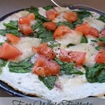 Tomato and Spinach Frittata with Havarti Cheese- This egg white frittata is a cinch to make. Load it with spinach, red onion, tomatoes, and Havarti cheese.