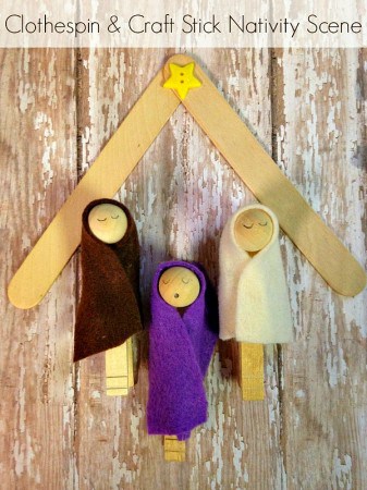 Clothespin Nativity Scene with a Popsicle Stick Stable- This Nativity scene is a simple and frugal craft. Enjoy making one with your family this Christmas.