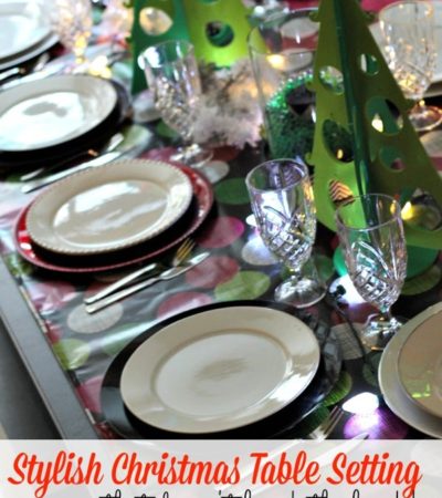 Setting your table for Christmas doesn't have to break the bank. Read my tips on how to pull of a Stylish Green, Red and White Christmas Table Setting. Pin it for later!
