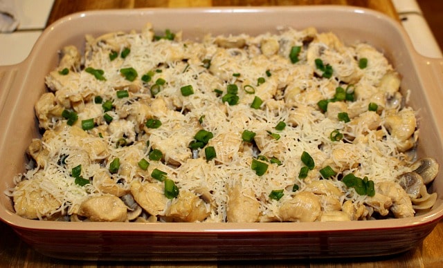Layer chicken and mushrooms over pasta then top with cheese and green onions when making a Chicken Marsala Bake