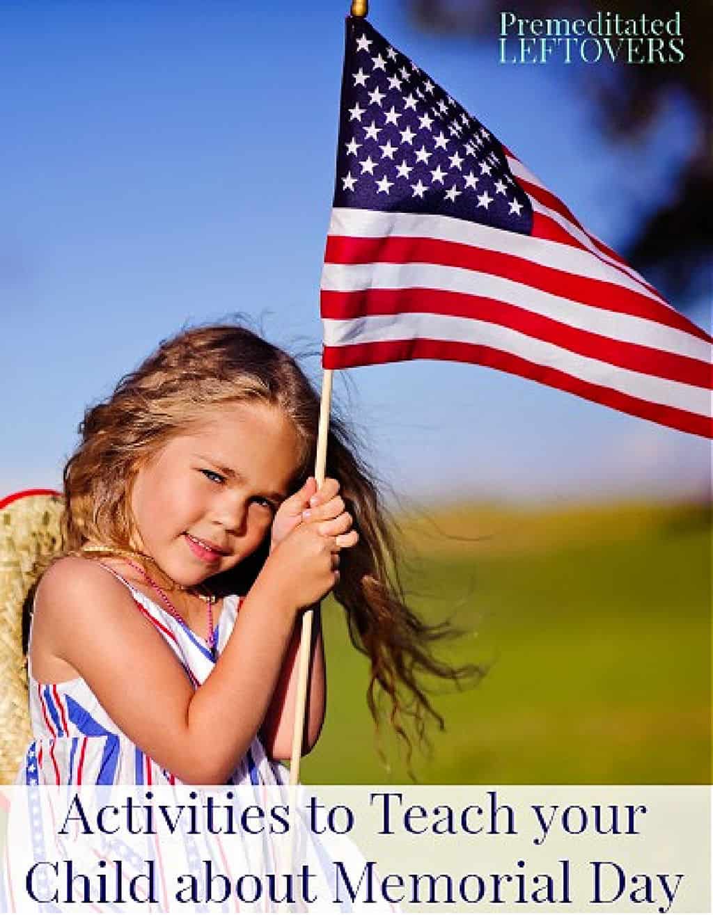 a little girl holding an American flag on Memorial Day