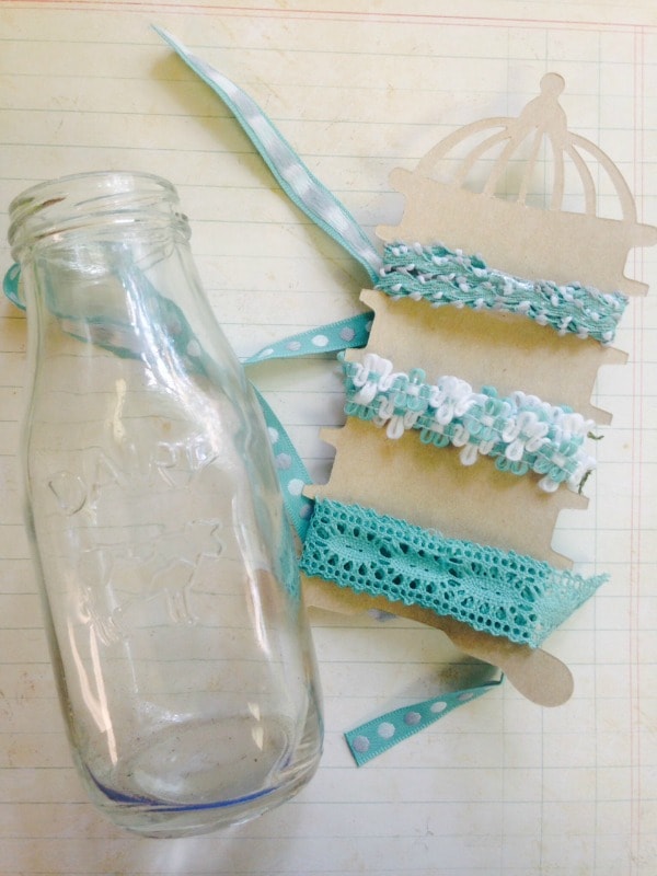 Ribbon and glass bottle for DIY hanging milk bottle vase