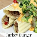 Turkey Burger Stuffed Manicotti- This new take on a classic dinner dish will leave your family coming back for more. Try this easy stuffed manicotti recipe!